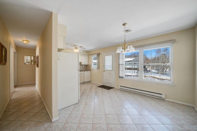 430 Falmouth Court A, Ridge, NY 11961