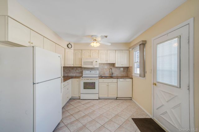 430 Falmouth Court A, Ridge, NY 11961