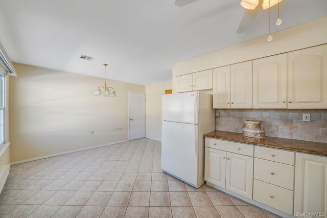 430 Falmouth Court A, Ridge, NY 11961