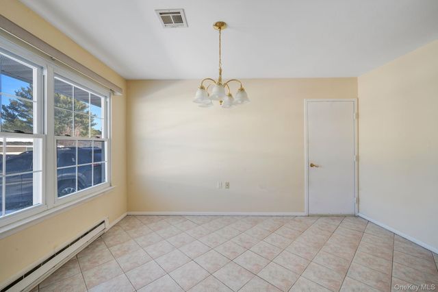 430 Falmouth Court A, Ridge, NY 11961