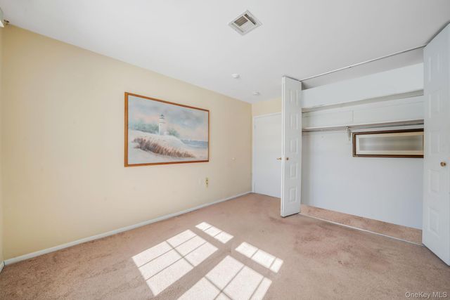 430 Falmouth Court A, Ridge, NY 11961