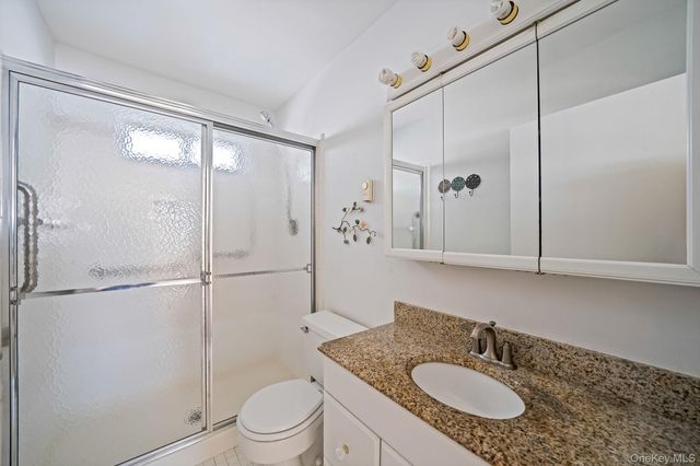 430 Falmouth Court A, Ridge, NY 11961