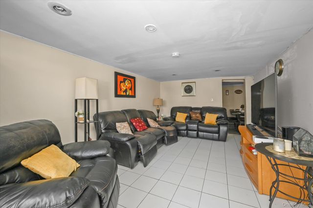 77-06 Kneeland Avenue, Elmhurst, NY 11373