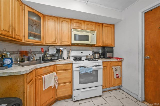 77-06 Kneeland Avenue, Elmhurst, NY 11373