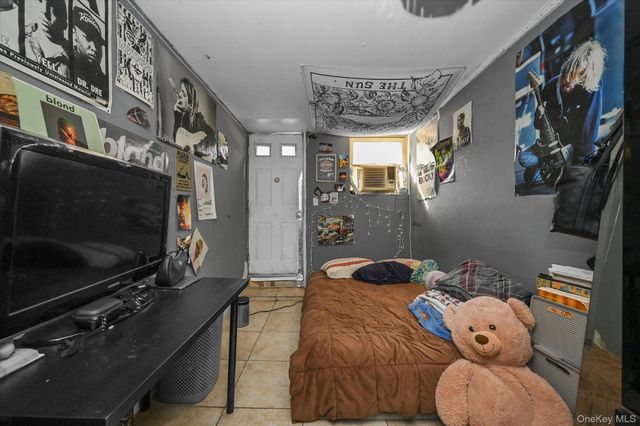 77-06 Kneeland Avenue, Elmhurst, NY 11373