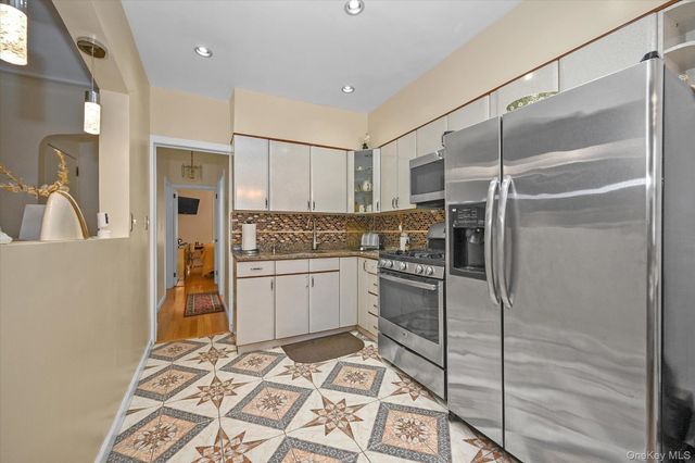 77-06 Kneeland Avenue, Elmhurst, NY 11373