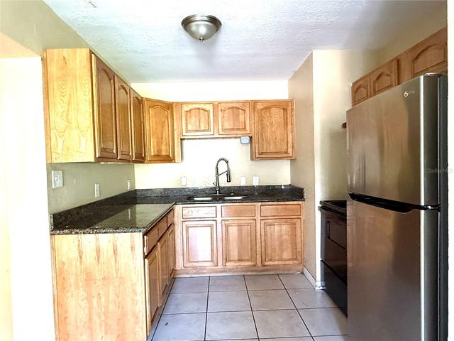 3715 E IDLEWILD AVENUE, Tampa, FL 33610