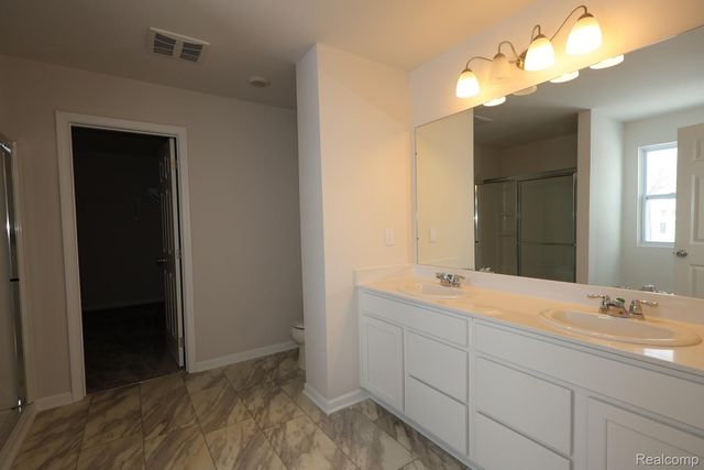 709 Whisperwood Way, Chelsea, MI 48118