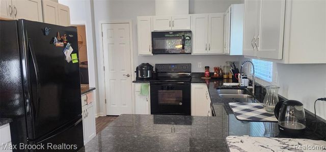 29574 Woodpark Circle, Warren, MI 48092