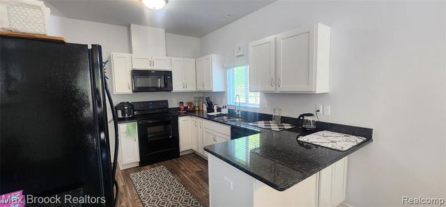 29574 Woodpark Circle, Warren, MI 48092