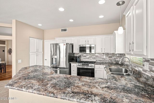 14912 W YOSEMITE Drive, Sun City West, AZ 85375