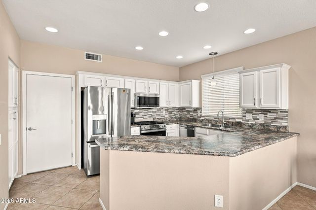 14912 W YOSEMITE Drive, Sun City West, AZ 85375