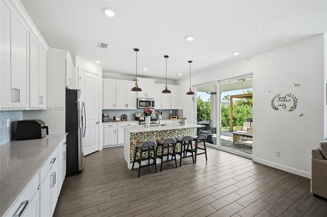 1322 Timber Reap Trail, Loxahatchee, FL 33470
