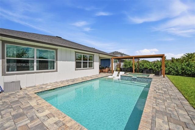 1322 Timber Reap Trail, Loxahatchee, FL 33470