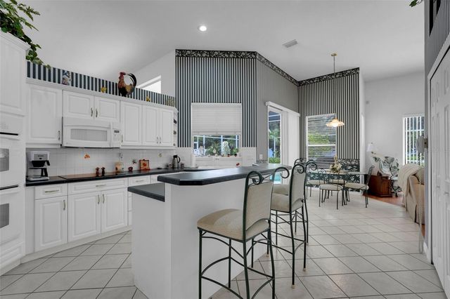 8003 BELSHIRE DRIVE, Orlando, FL 32835