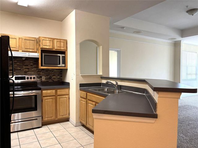 6663 QUEENS BOROUGH AVENUE 303, Orlando, FL 32835