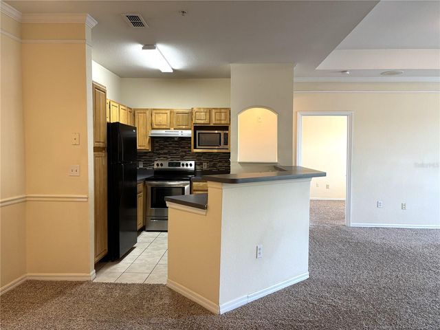 6663 QUEENS BOROUGH AVENUE 303, Orlando, FL 32835