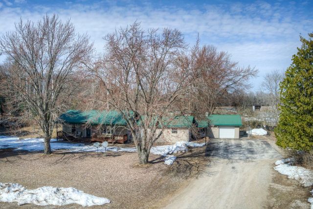 4793 E Duck Lake Road, Grawn, MI 49637