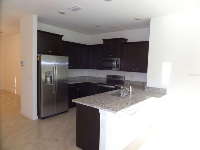 8051 PENROSE PLACE, Wildwood, FL 34785