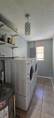 2240 NE Rustic Way, Jensen Beach, FL 34957