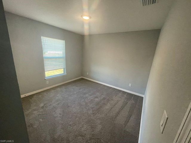 3112 55th ST W, Lehigh Acres, FL 33971