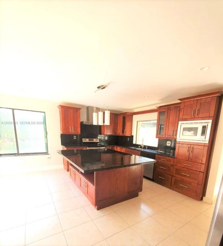 613 Patio Village Way, Weston, FL 33326