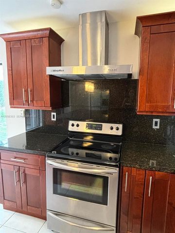 613 Patio Village Way, Weston, FL 33326