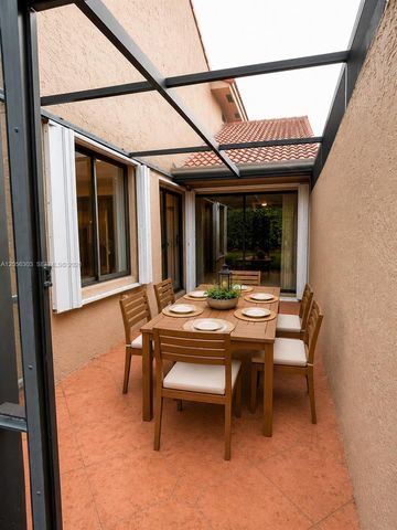 613 Patio Village Way, Weston, FL 33326