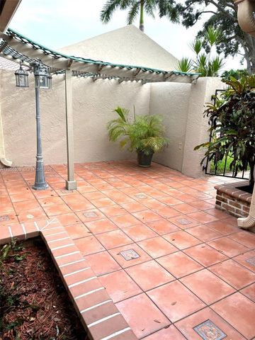 613 Patio Village Way, Weston, FL 33326