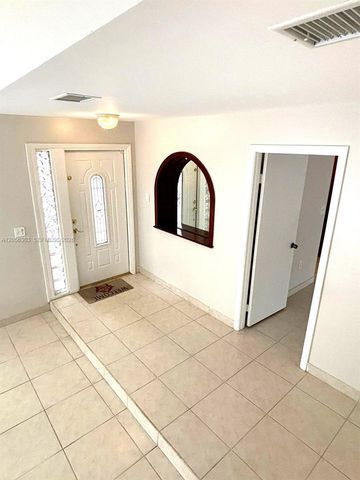 613 Patio Village Way, Weston, FL 33326