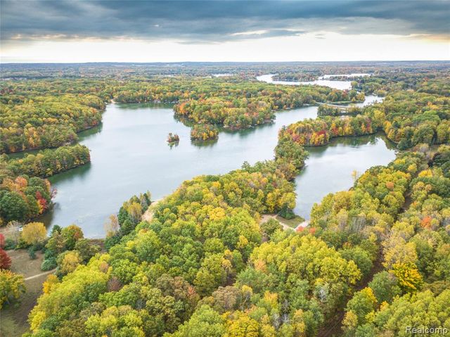 12090 Cape Breton Drive, Canadian Lakes, MI 49346