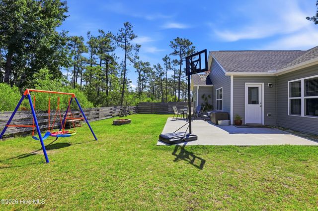 4432 Pinewood Village Drive SE, Southport, NC 28461