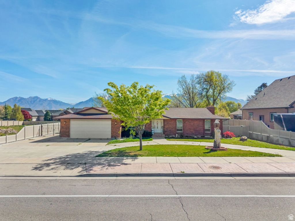 Image 2 of property listing at 10261 S 3200 W, South Jordan, UT 84095