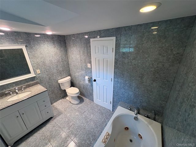 9 Sugarbush Lane, Coram, NY 11727