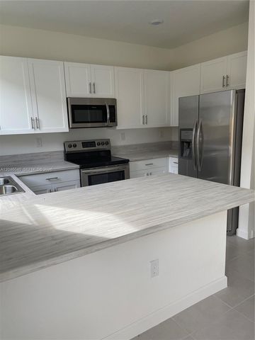 21447 NE 2nd Place, Miami, FL 33179
