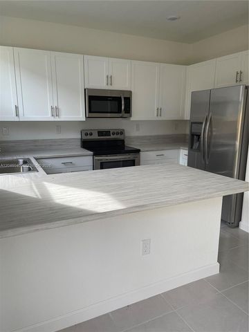 21447 NE 2nd Place, Miami, FL 33179