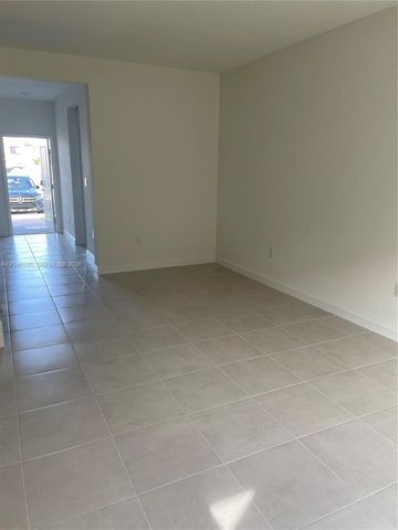 21447 NE 2nd Place, Miami, FL 33179