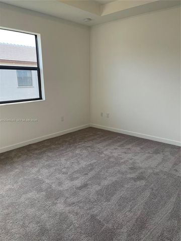 21447 NE 2nd Place, Miami, FL 33179
