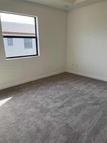 21447 NE 2nd Place, Miami, FL 33179