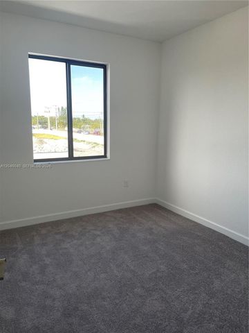 21447 NE 2nd Place, Miami, FL 33179