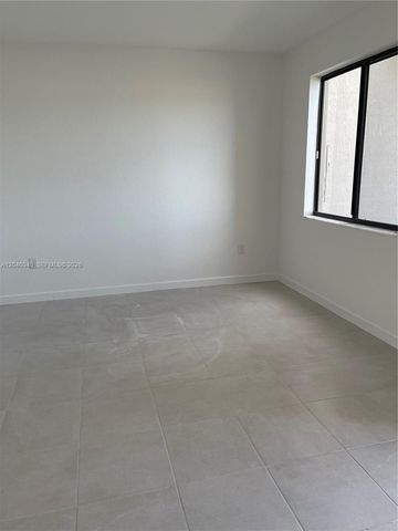 21447 NE 2nd Place, Miami, FL 33179