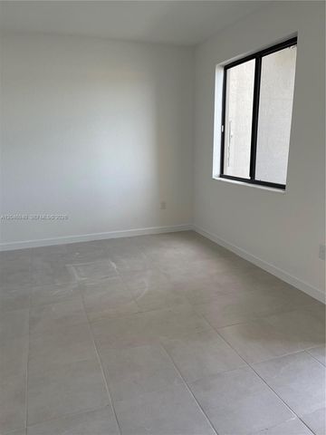 21447 NE 2nd Place, Miami, FL 33179