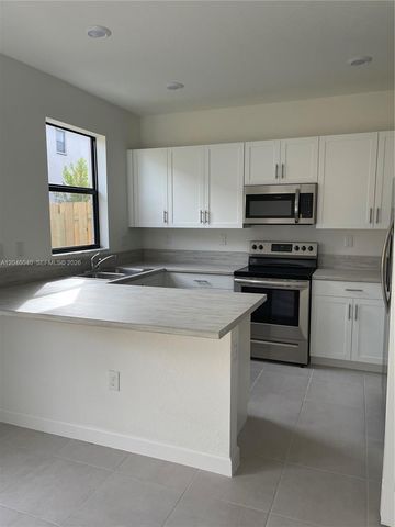 21447 NE 2nd Place, Miami, FL 33179