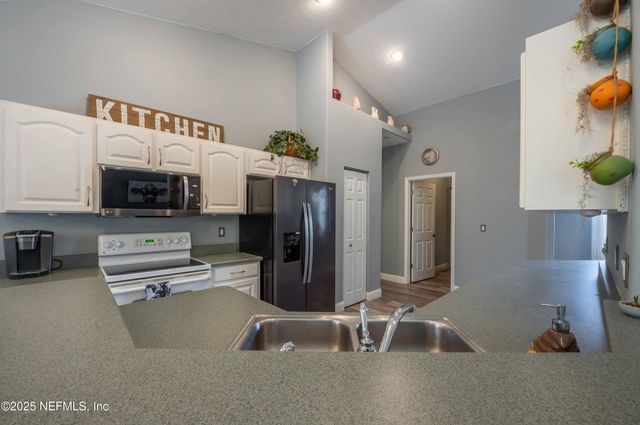 12 WHIRLAWAY Drive, Palm Coast, FL 32164