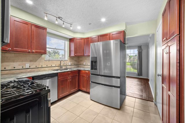 12235 Alston Drive, Meadows Place, TX 77477