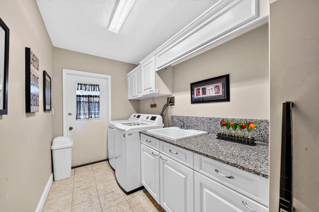 7100 E Cypresshead Drive E, Parkland, FL 33067