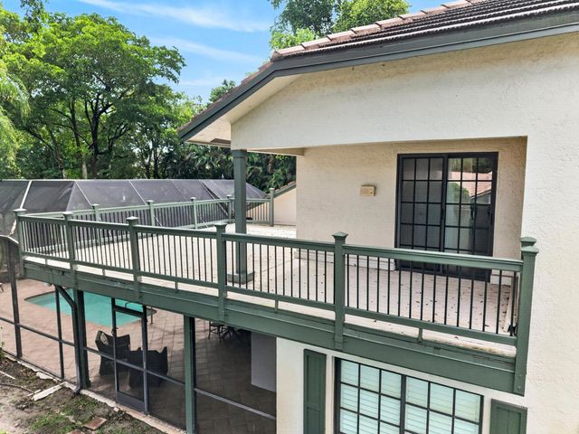 7100 E Cypresshead Drive E, Parkland, FL 33067