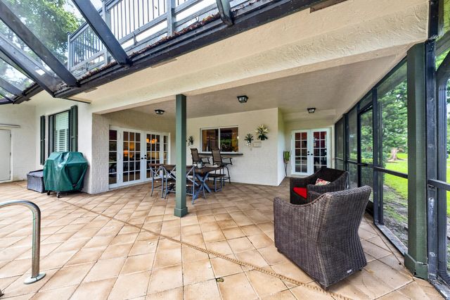 7100 E Cypresshead Drive E, Parkland, FL 33067