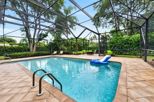 7100 E Cypresshead Drive E, Parkland, FL 33067