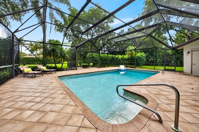 7100 E Cypresshead Drive E, Parkland, FL 33067